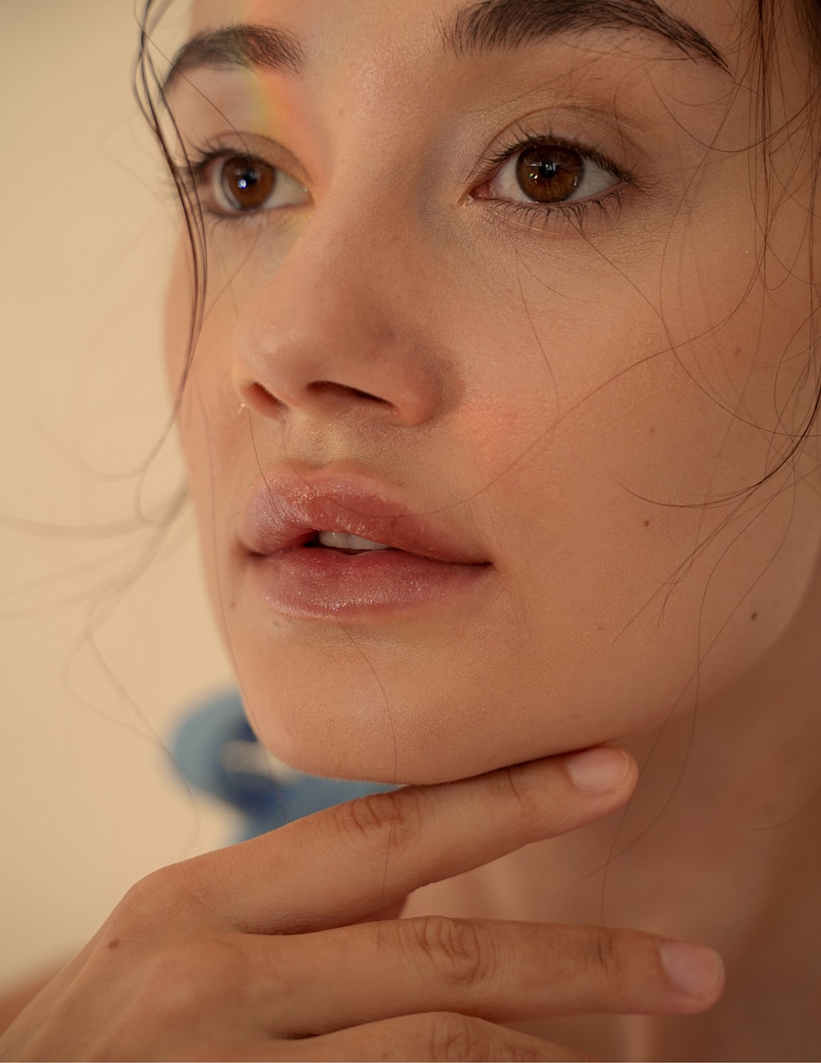 Woman with closed eyes and soft expression.